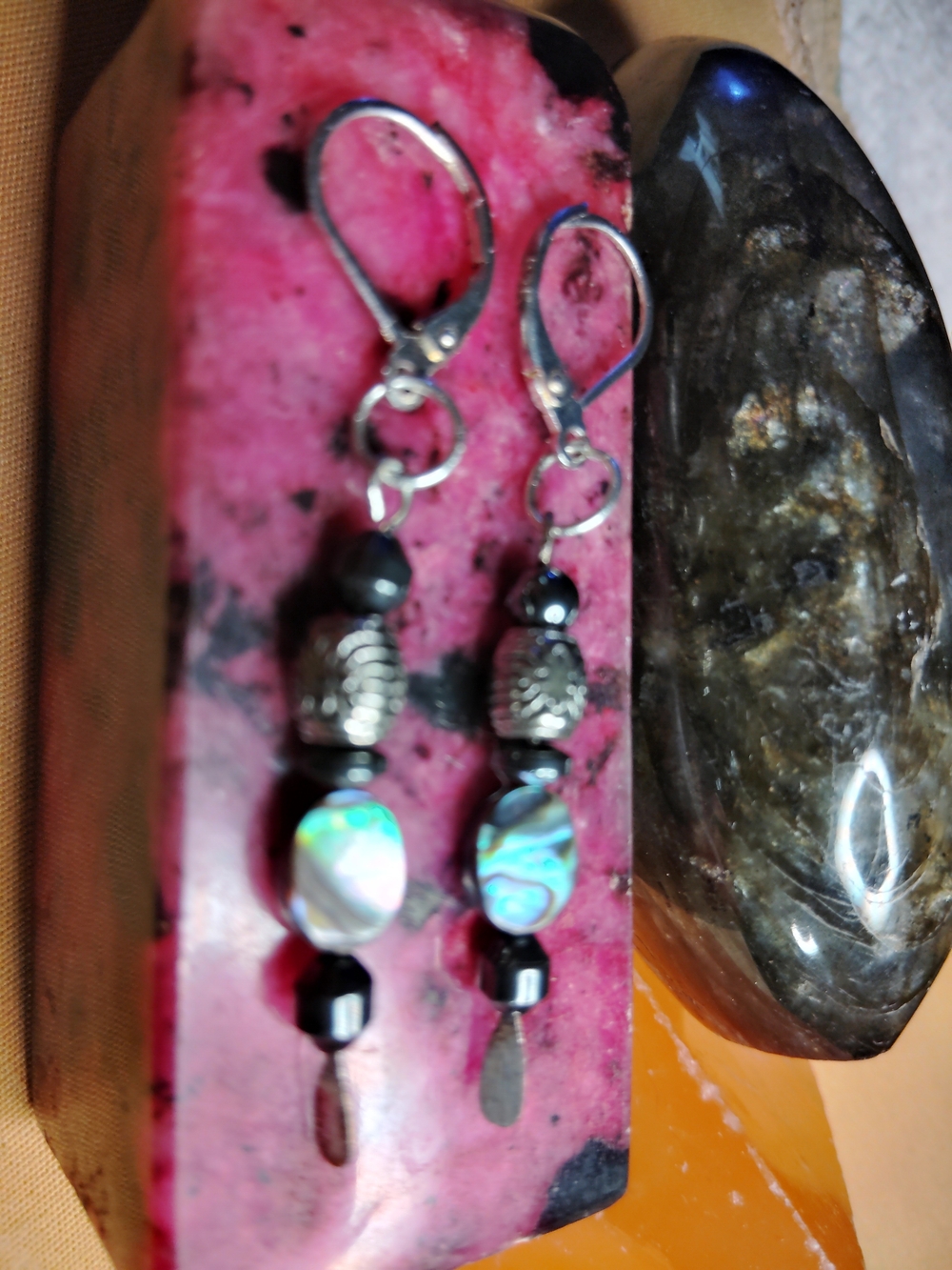 ABALONE DROP EARRINGS. SOLID STERLING SILVER. HEMATITE ACCENTS--1-1/2 INCH LONG.